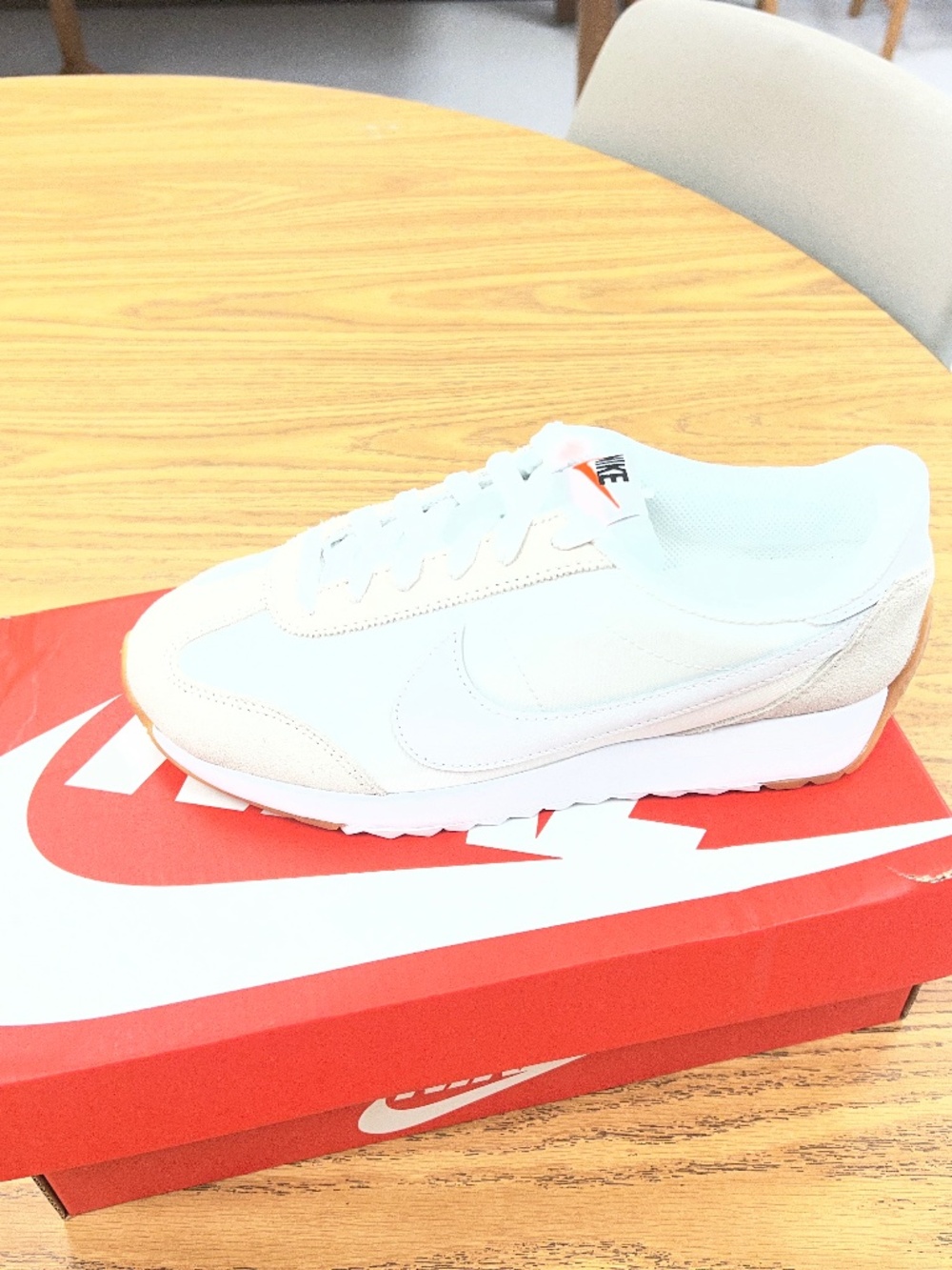 White with tan rubber sole Nike Shoe